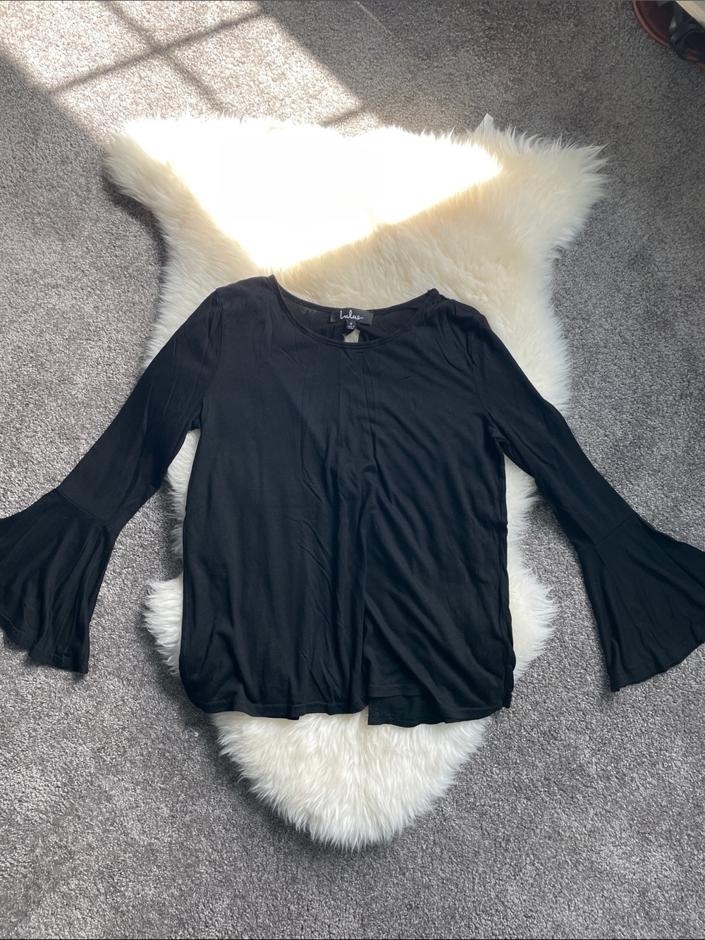 Lulu’s bell sleeve open back top